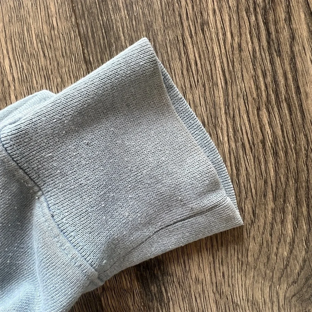 The North Face Blue Sweater with Iconic Branding